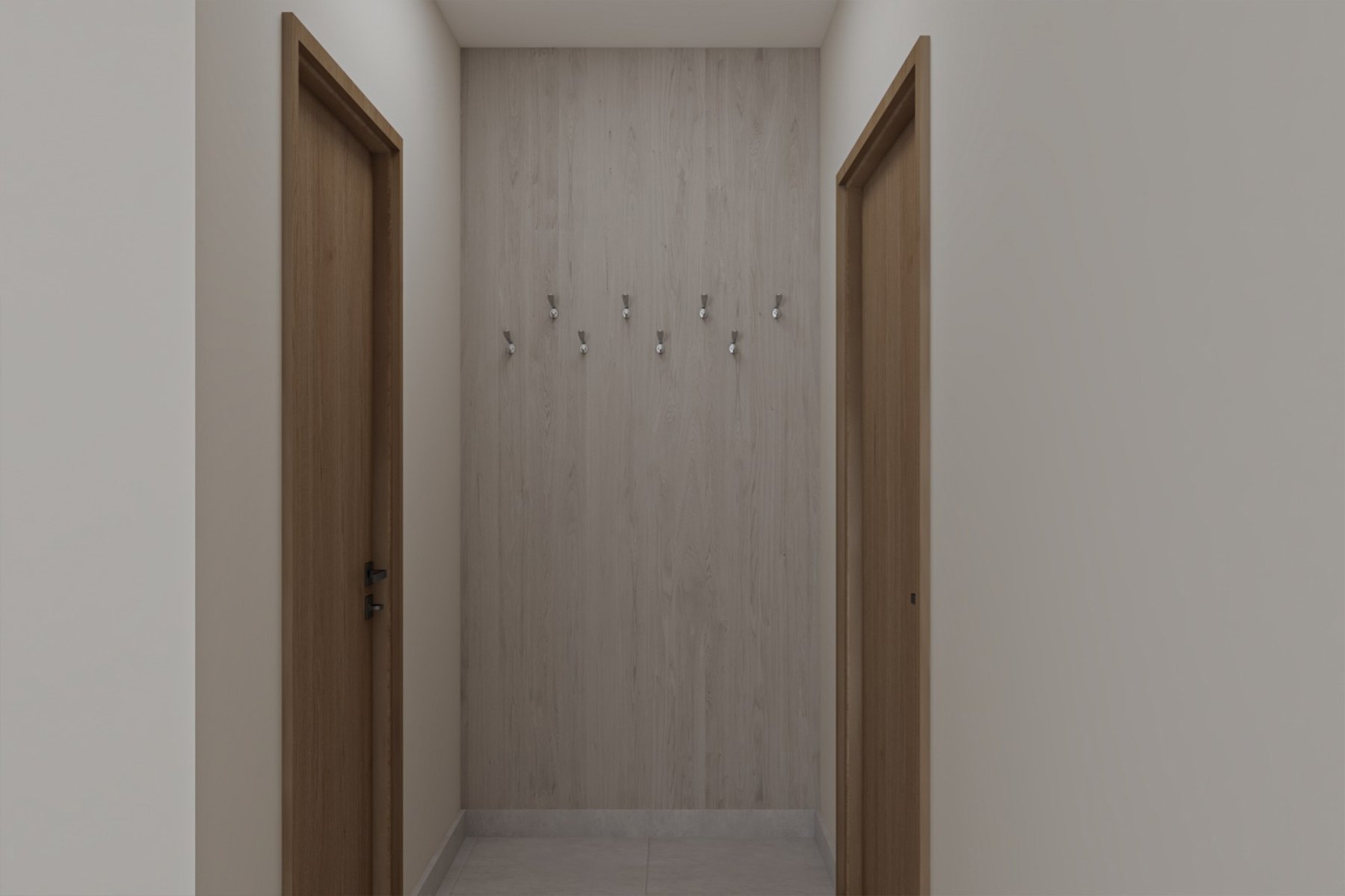 مدخل منزلي مودرن بتصميم عملي يضم لوحة تعليق ملابس خشبية مع علاقات معدنية، مقعد جلوس مدمج، ووحدة تخزين أحذية سفلية، مناسب لمداخل الشقق والفلل في السعودية.